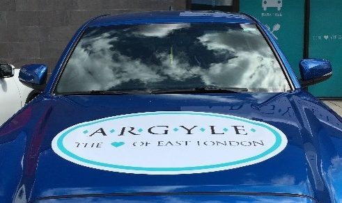 a blue truck with an Argyle BIA decal